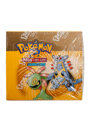 Pokemon Trading Card Game booster pack, EX Sandstorm expansion, sealed in clear plastic with bright orange packaging and cartoon creatures artwork.